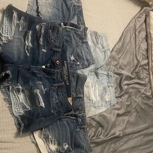 American Eagle Outfitters Women's Ripped Denim Shorts - Dark and Light Blue.